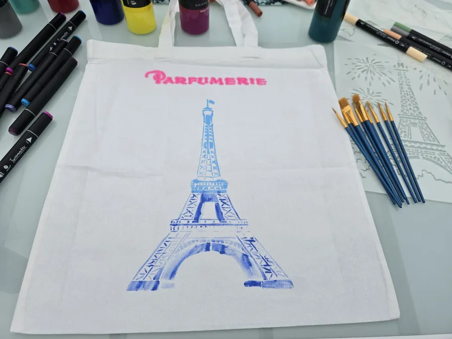 Tote bag with Eiffel Tower stencil design.
