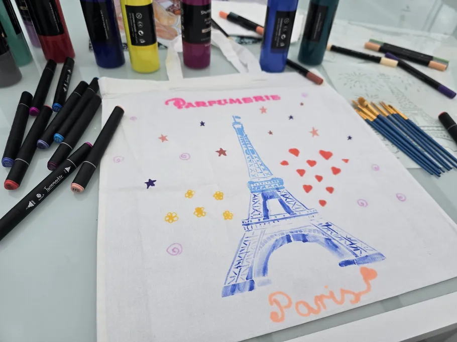 Eiffel Tower drawing surrounded by markers.