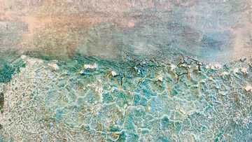 Textured abstract painting with blue and beige tones.