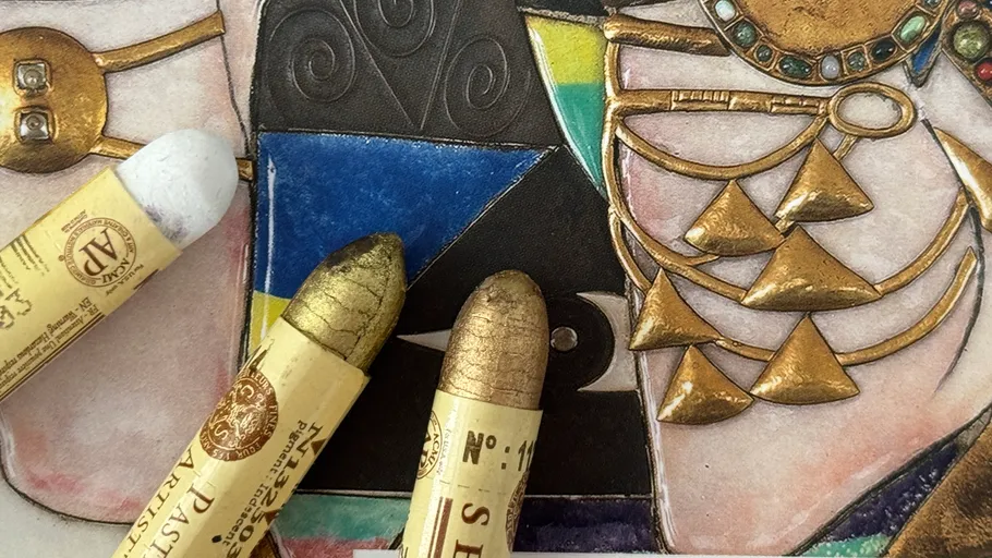 Colored oil pastels on geometric artwork.