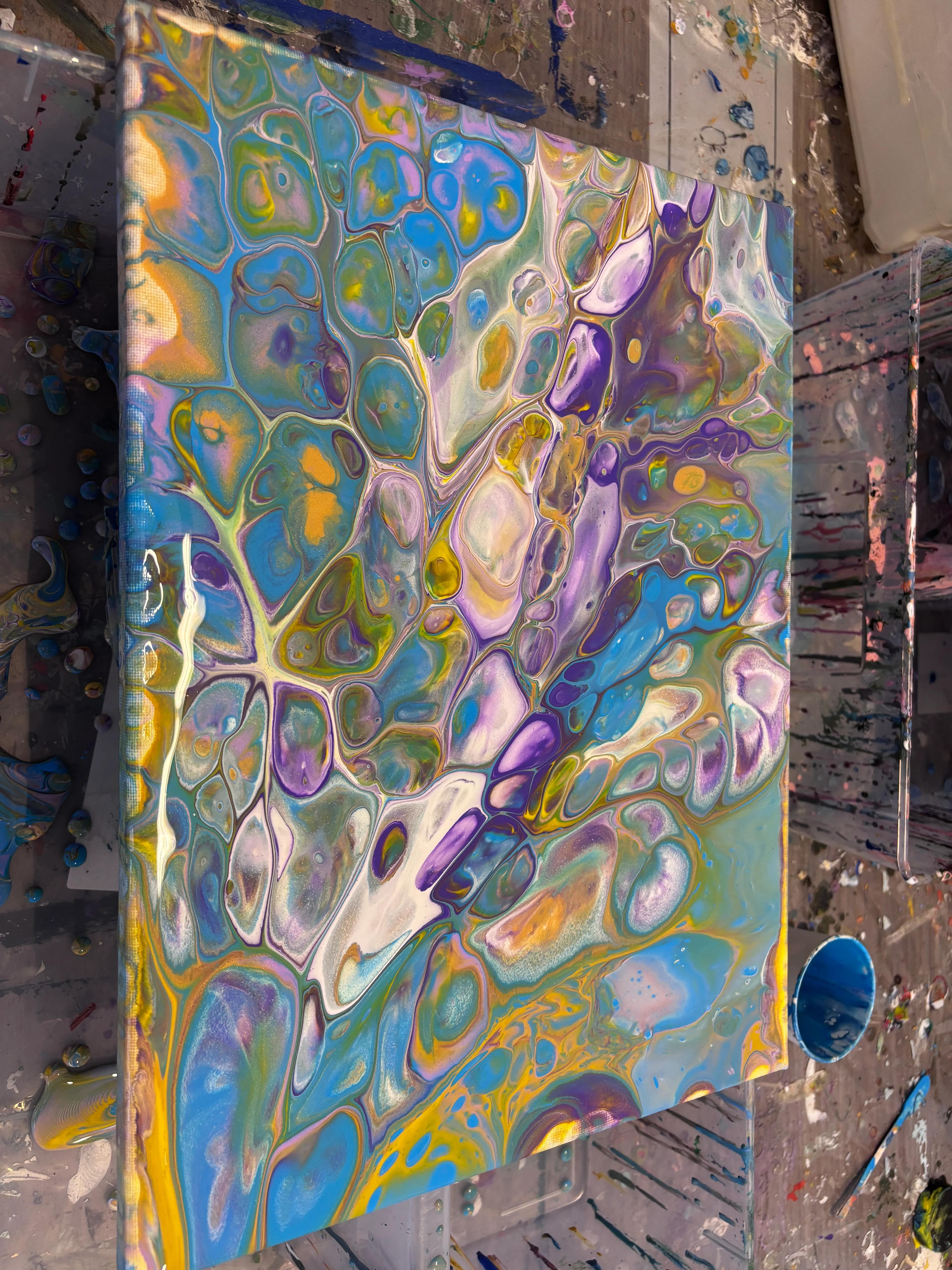 Colorful abstract painting with cell patterns.