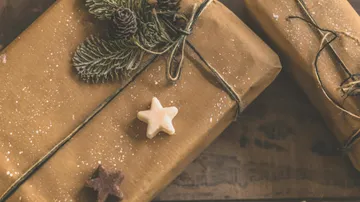 Brown paper packages with star decorations.
