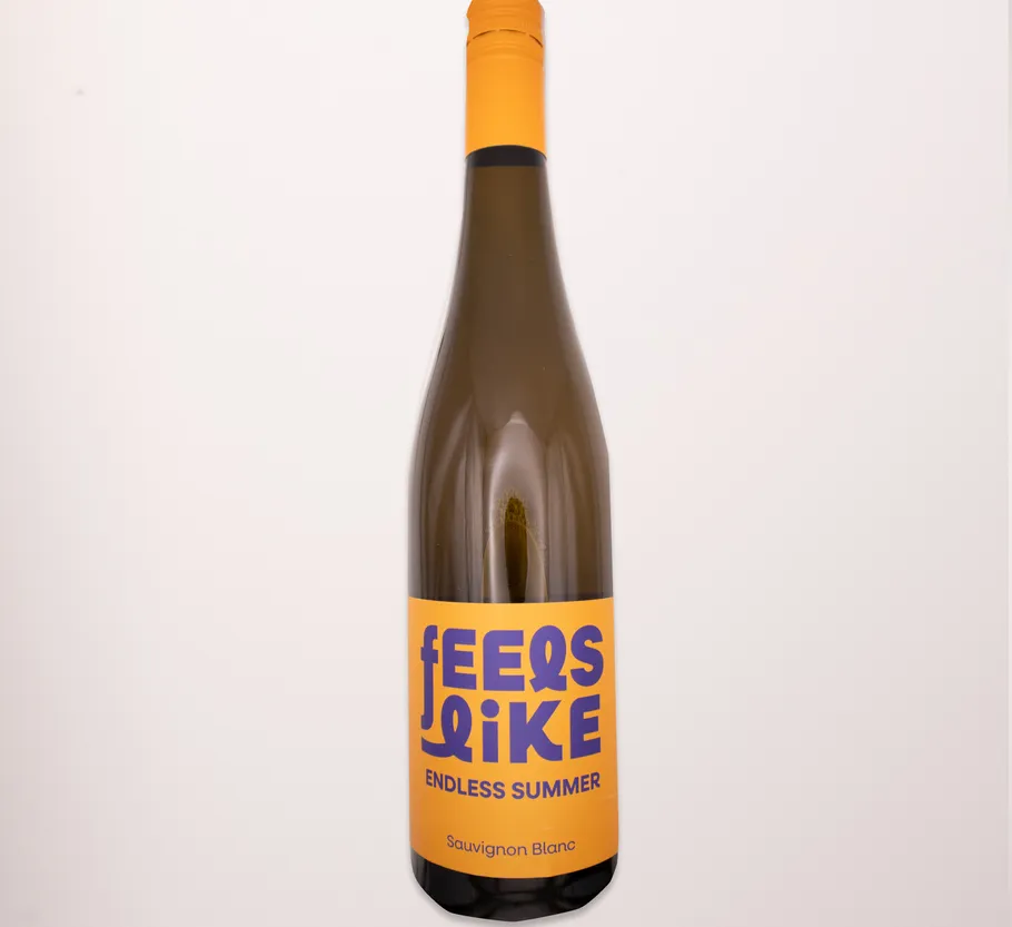 Wine bottle with yellow label on white background.