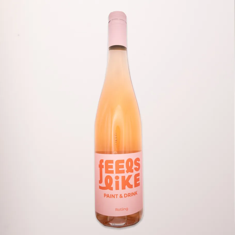 Pink wine bottle with minimalist label.
