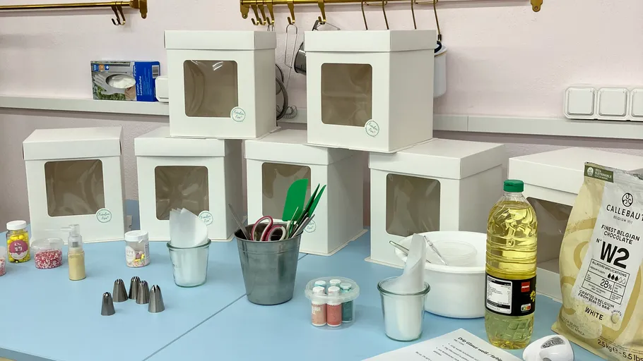 Baking supplies and boxes on kitchen counter.