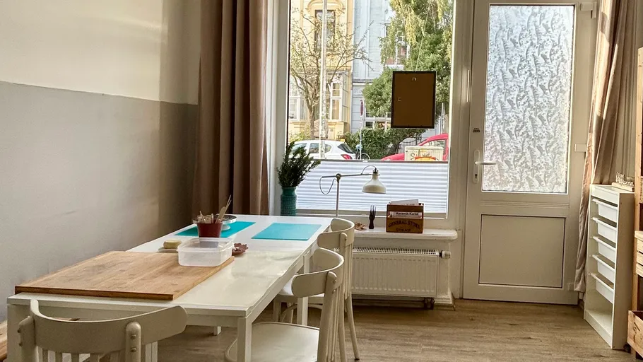 Dining table in a bright, cozy room.