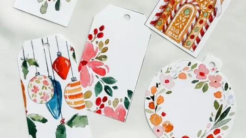 Colorful Christmas gift tags with decorations.