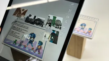 Tablet displaying augmented reality with traffic light.