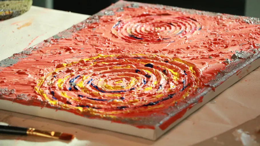 Textured painting on canvas with swirls.