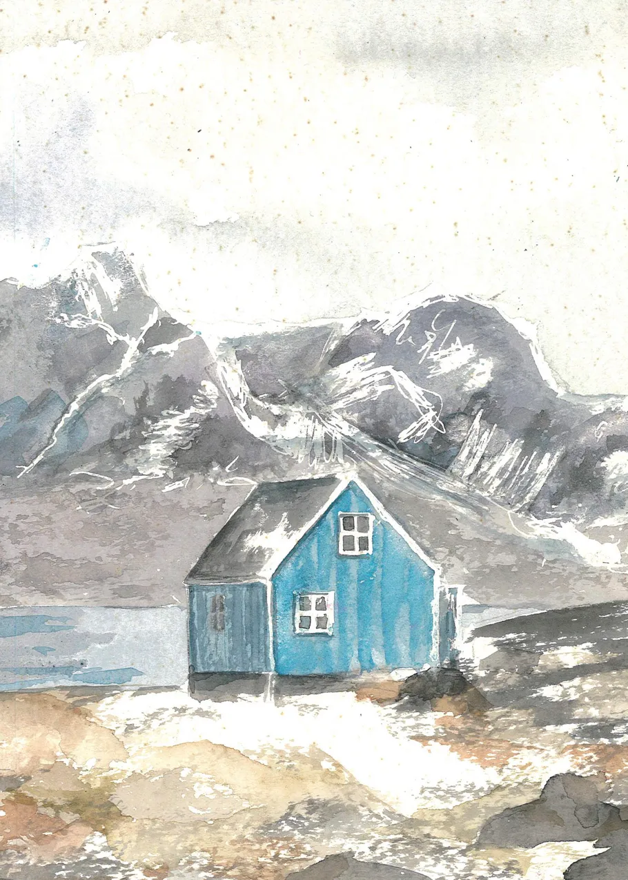 Blue house with mountains in background.