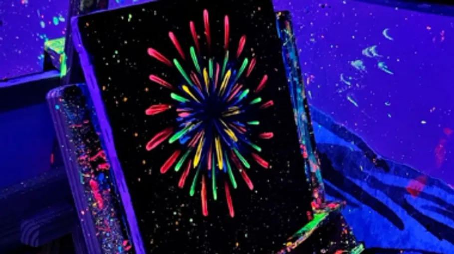 Colorful abstract painting under blacklight.