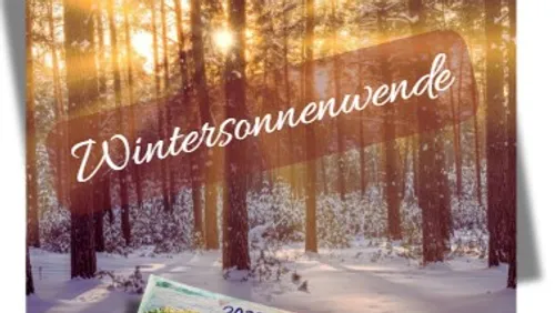 Sunlit snowy forest with 'Wintersonnenwende' text.