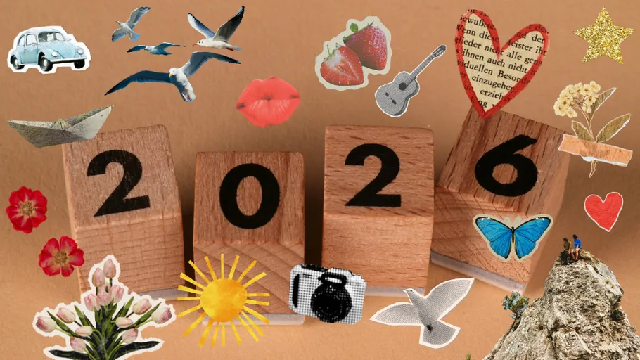 Wooden blocks showing 2026, surrounded by stickers.