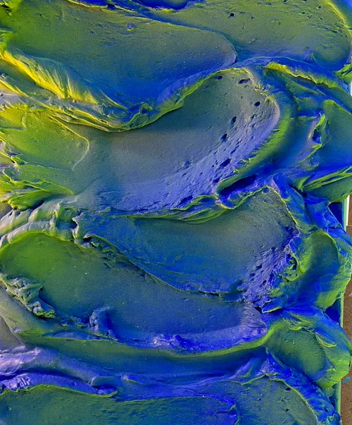 Blau und grün strukturierte abstrakte Kunst.