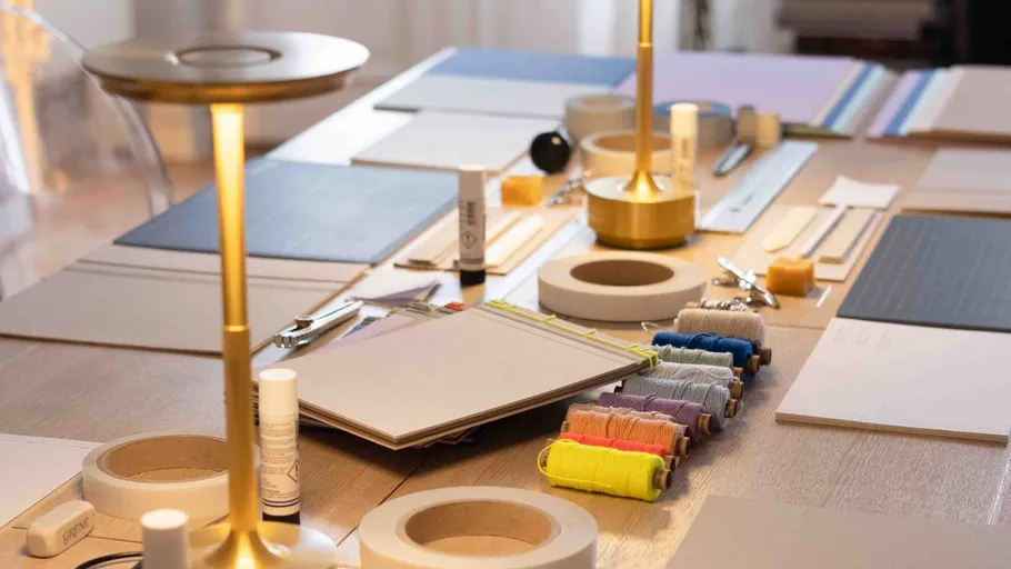 Craft supplies on a wooden table.