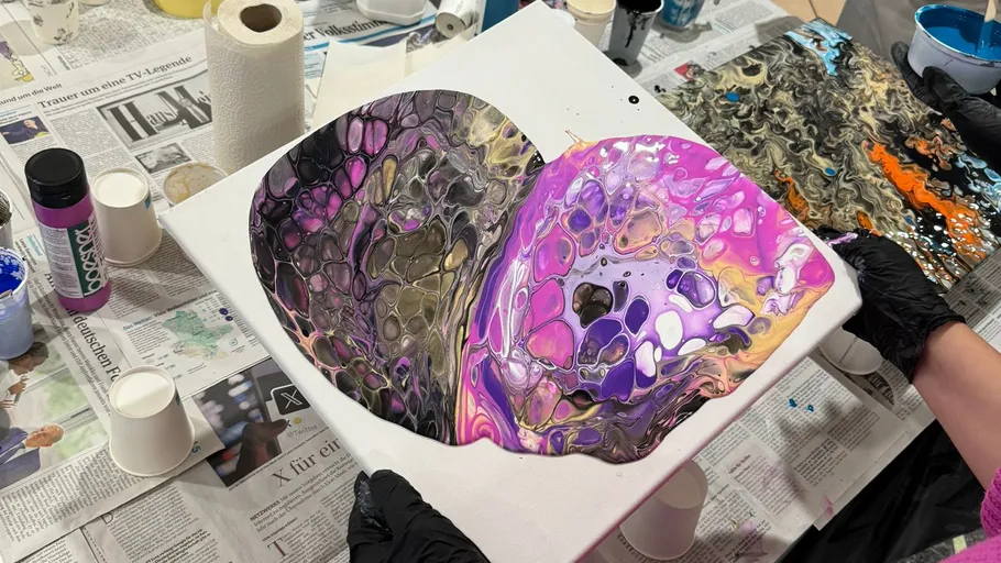 Painting with colorful abstract design on canvas.