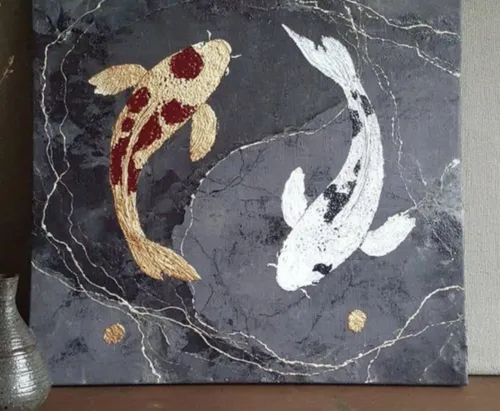 Two koi fish painted on dark canvas.