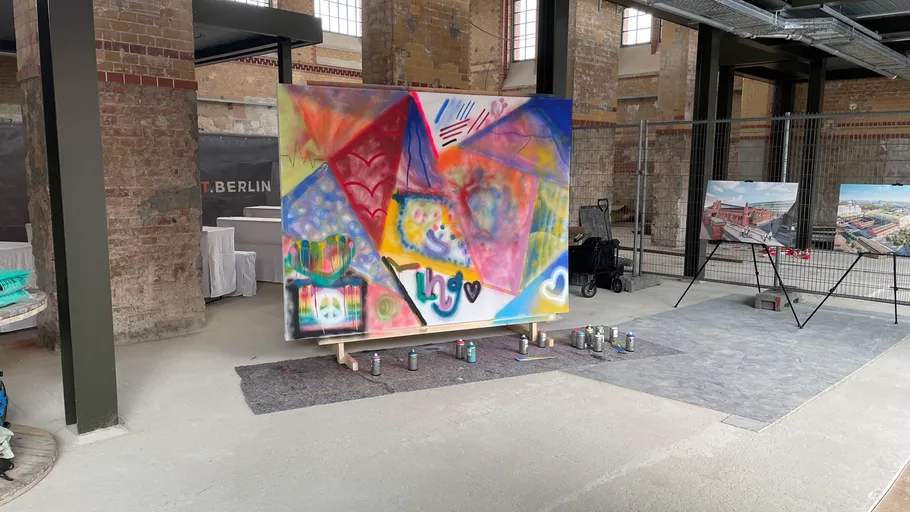 Colorful abstract painting in industrial space.