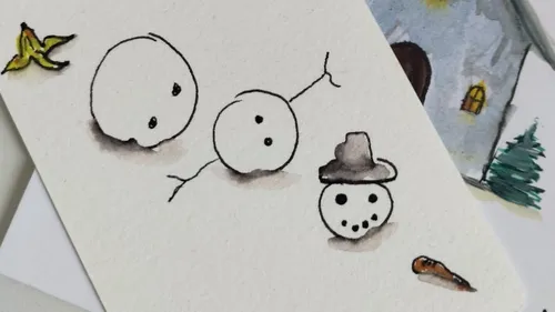 Three snowballs, hat, carrot, and banana peel.