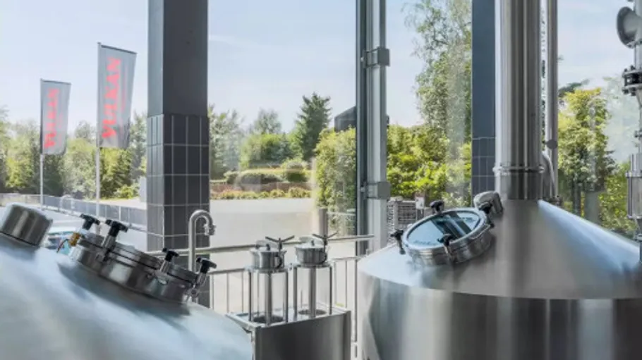 Large brewing tanks in a modern brewery.