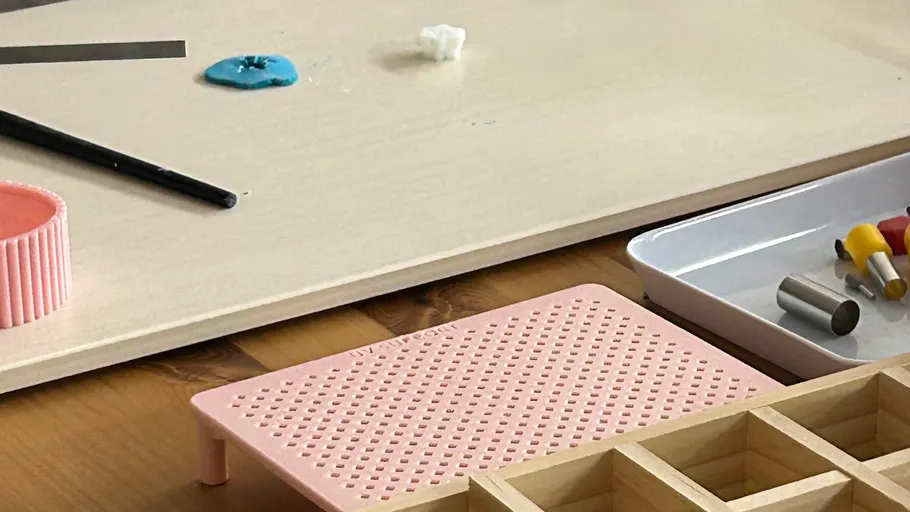 Craft tools on a wooden table.