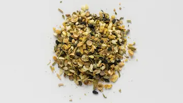Pile of mixed spices on white background.