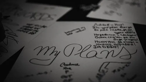 Handwritten notes and doodles on paper.