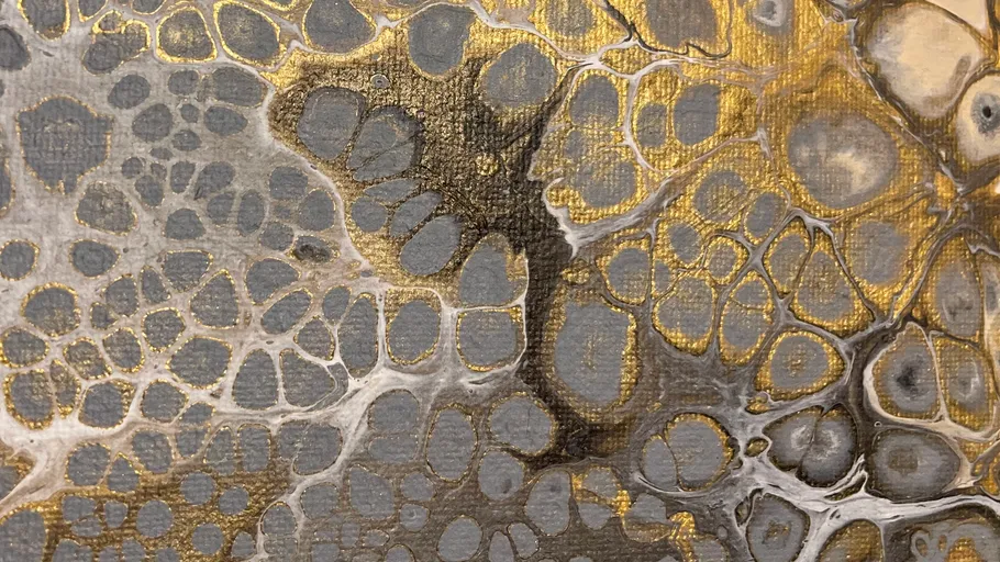 Abstract gold and gray textured painting.