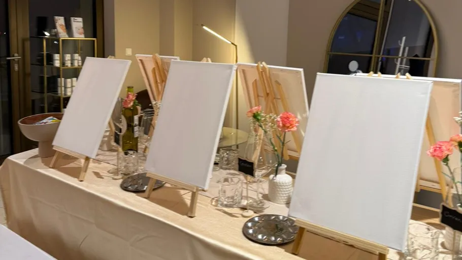 Blank canvases on easels in art class.