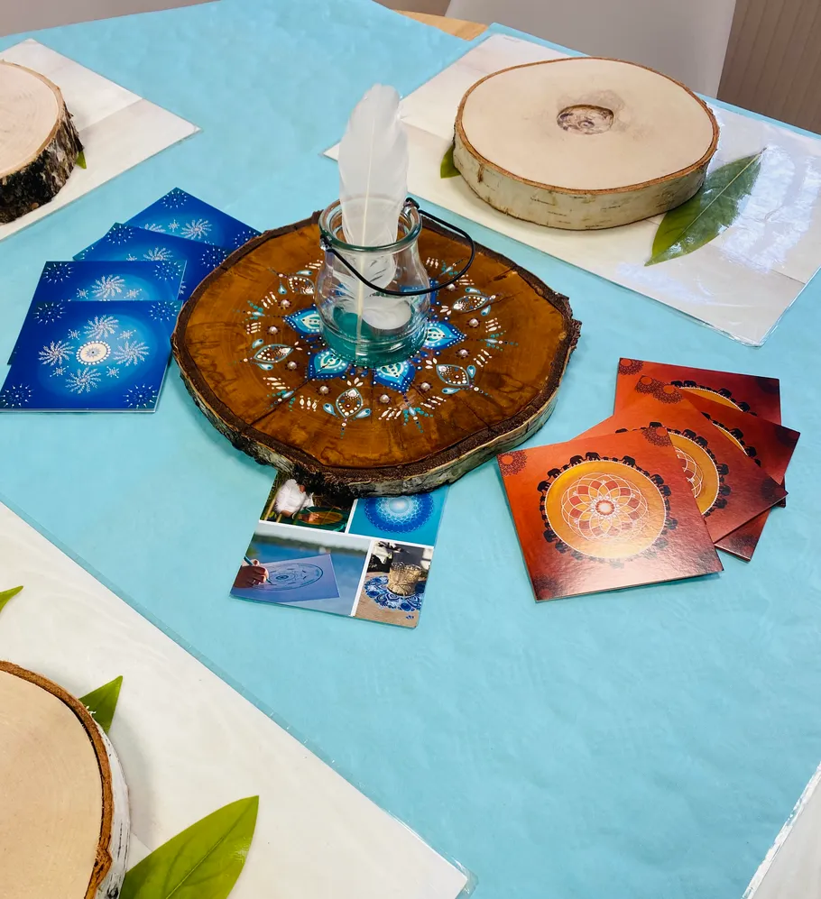 Decorative table with cards and wood slabs.