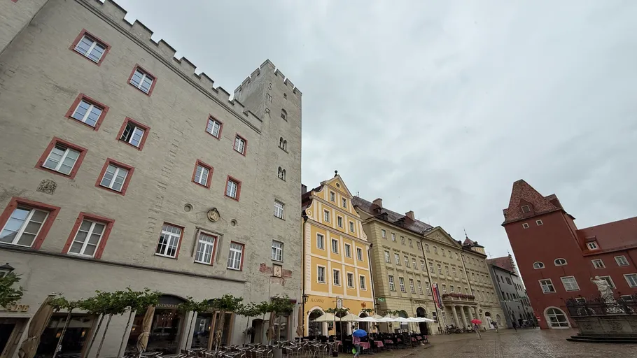 Historic European square with colorful buildings.