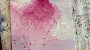 Abstract red and pink textured painting.