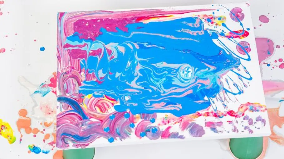 Colorful abstract painting with swirling patterns.