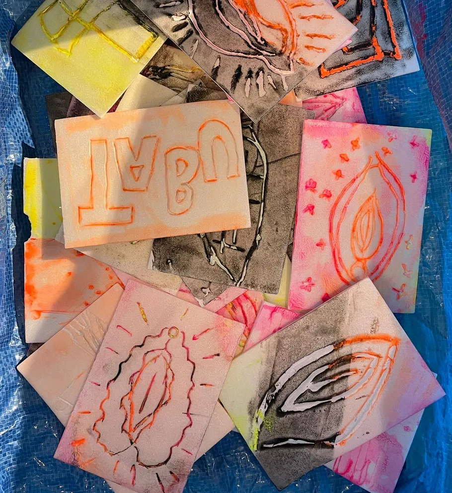 Colorful, abstract drawings on small cards.