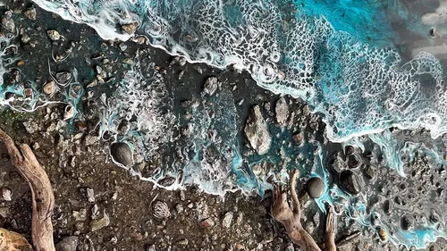 Waves crashing on a rocky shore.