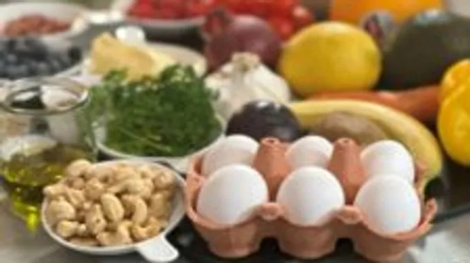 Variety of fresh foods on a kitchen counter.