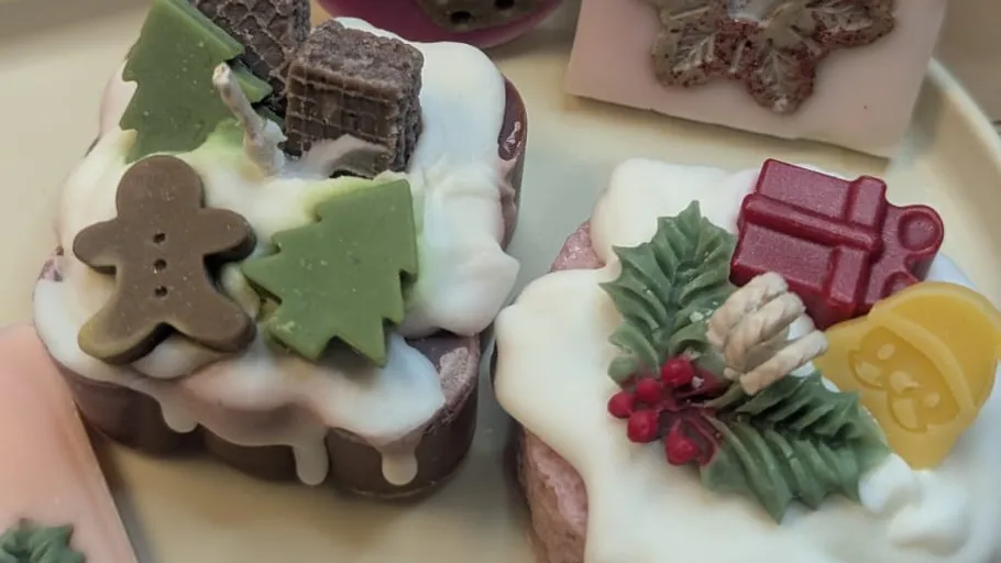 Festive decorated soaps with holiday motifs.