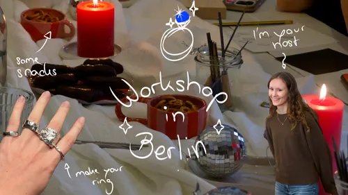 Jewelry workshop table with host and decorations.