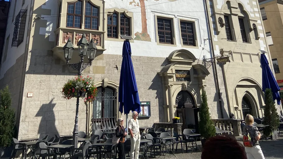 Historical building with outdoor seating.