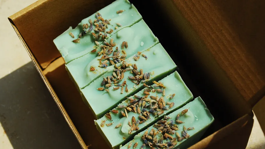 Green soap bars with lavender in a box.