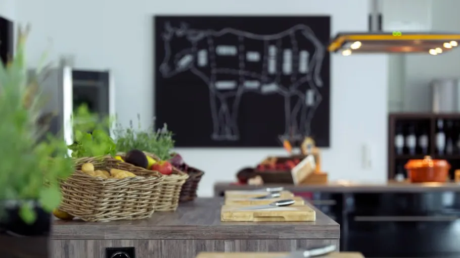 Kitchen with cutting boards and baskets.