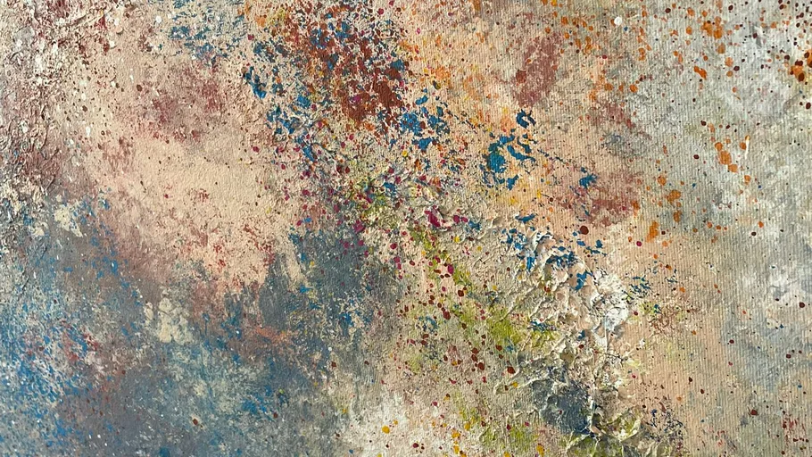 Abstract painting with colorful splatters, textured surface.