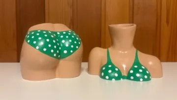 Ceramic torso and butt, green polka dot bikini.