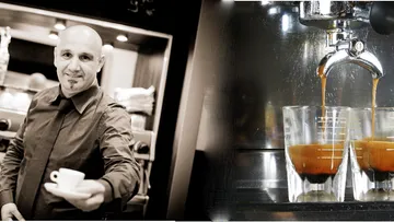 Barista serviert Espresso im Café.