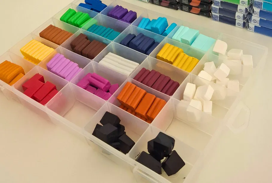 Colorful clay blocks in a plastic organizer.