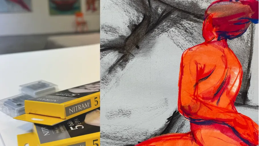 Art supplies and vibrant figure drawing in studio.