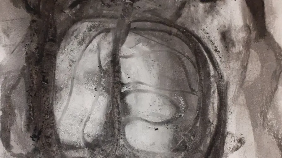 Abstract charcoal drawing with circular patterns.