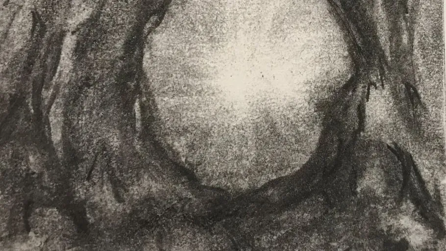 Circular light pattern on a textured background.