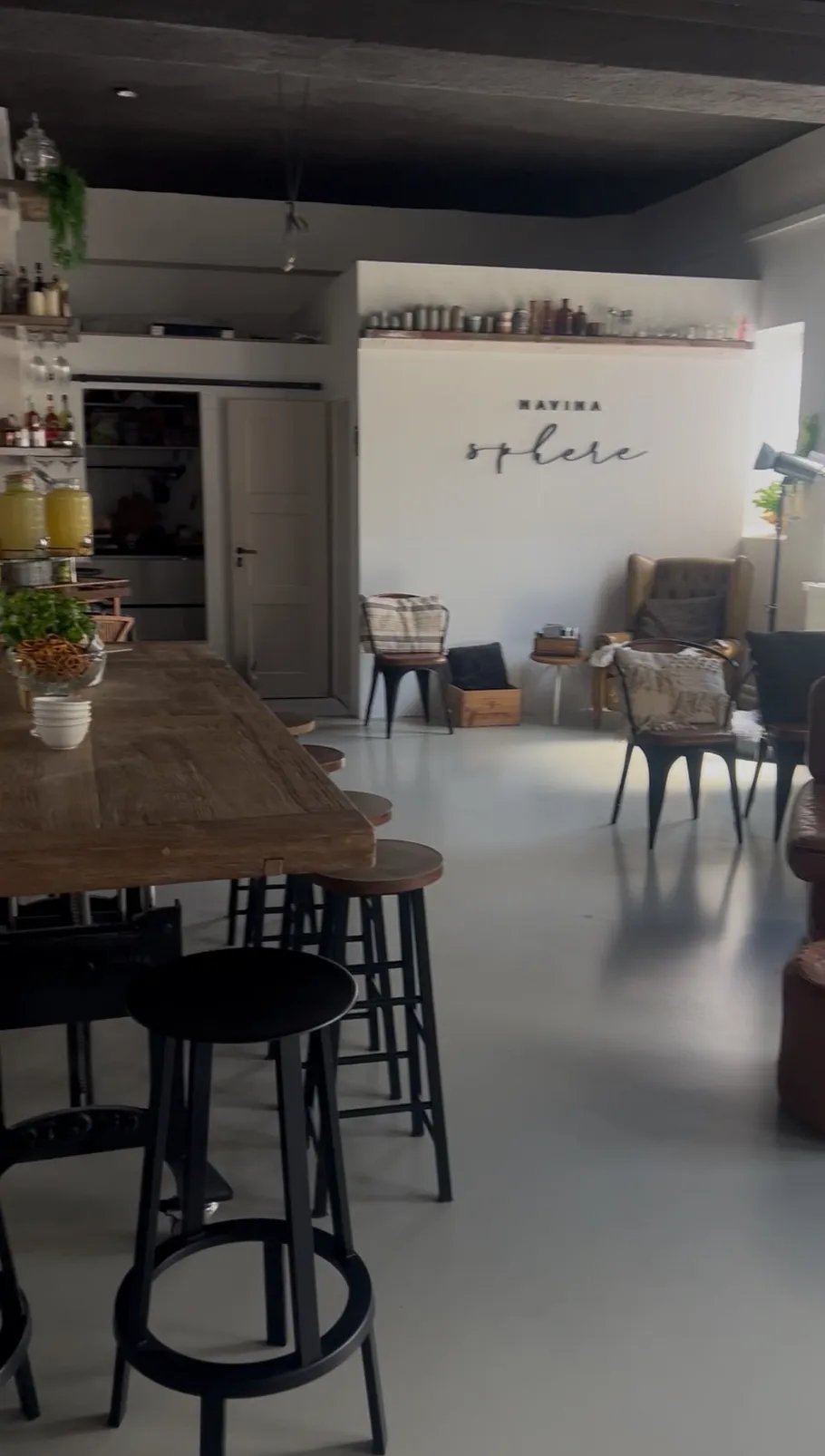 Cozy cafe with wooden furniture and decor.