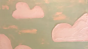 Pink clouds on a light green background.